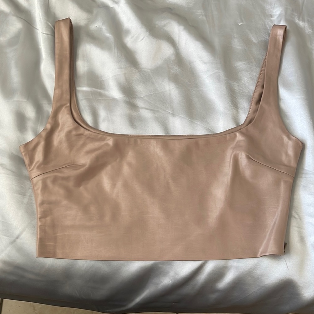 Free with $25 purchase. Nude/bronze silky crop top